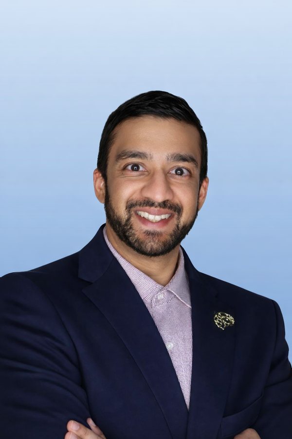 Portrait of Dr. Neil J. Patel, MD, MBA, board-certified sports neurologist